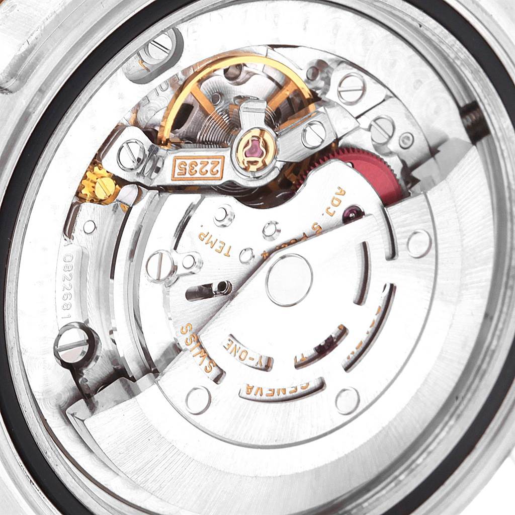 This image shows a close-up of the movement mechanism inside a Rolex Yacht-Master 168623 Men's Steel and Gold (two tone) Blue Dial 168623 Men's Steel and Gold (two tone) Blue Dial watch.