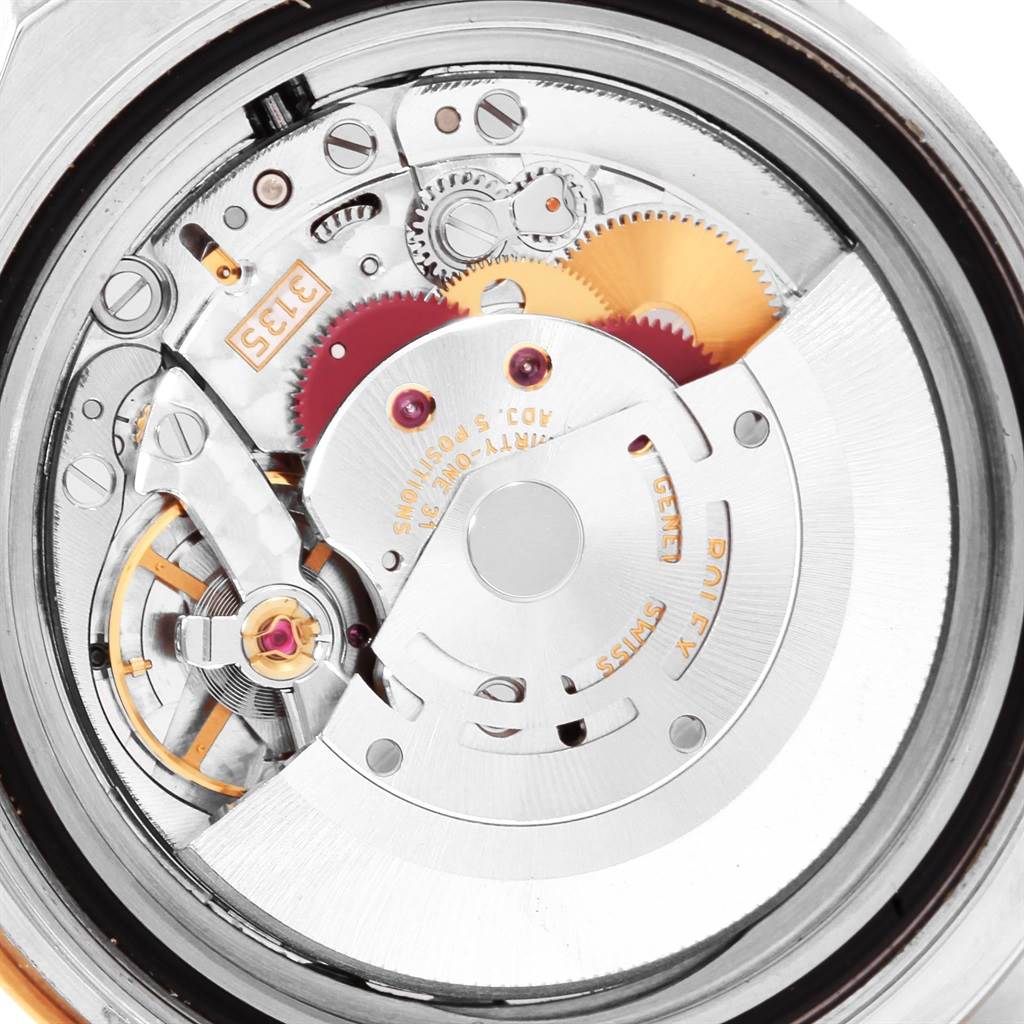 The image shows a close-up of the inner mechanical movement of a Rolex Yacht-Master 16623 Men
s Stainless Steel White Dial 16623 Men
s Stainless Steel White Dial watch.