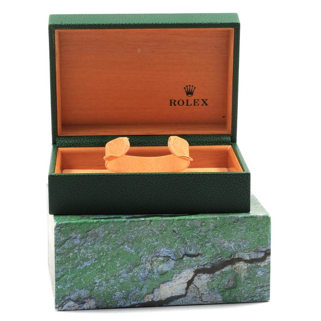 The image shows an open green Rolex Yacht-Master 68623 Men's Steel and Gold (two tone) White Dial 68623 Men's Steel and Gold (two tone) White Dial watch box from a front angle.