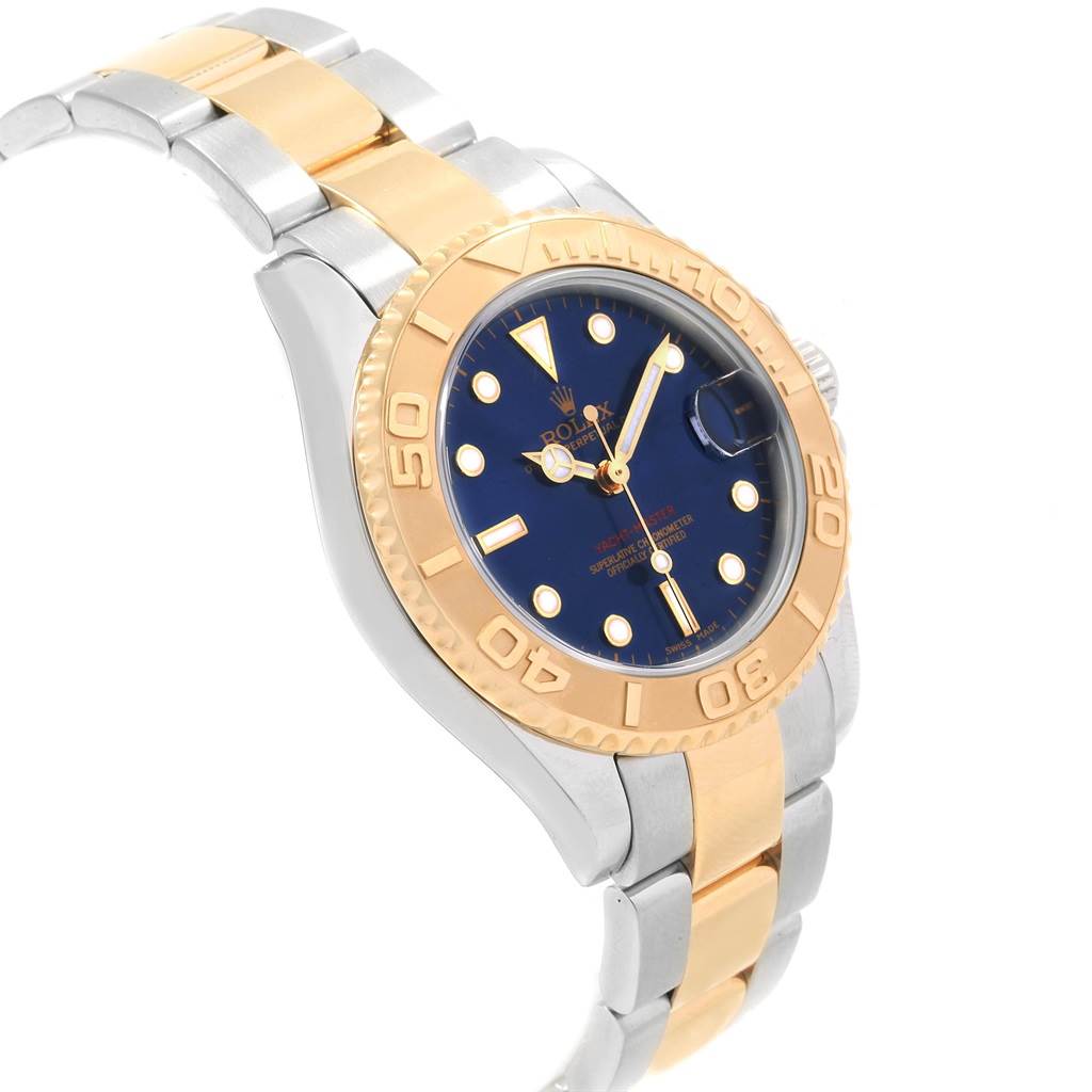 The Rolex Yacht-Master 168623 Men's Steel and Gold (two tone) Blue Dial 168623 Men's Steel and Gold (two tone) Blue Dial watch is shown at an angle highlighting the dial, bezel, and part of the two-tone bracelet.