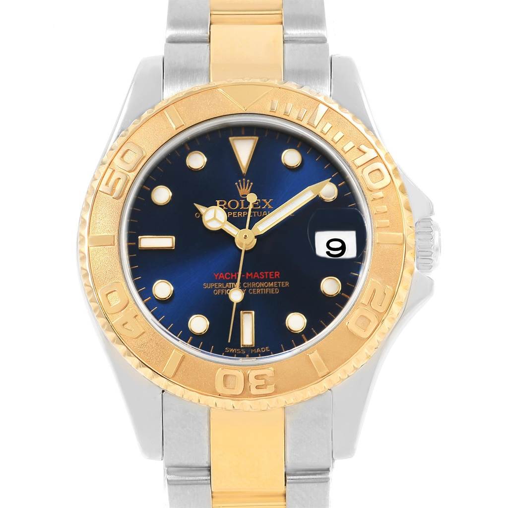 The Rolex Yacht-Master 168623 Men's Steel and Gold (two tone) Blue Dial 168623 Men's Steel and Gold (two tone) Blue Dial watch is shown from the front, displaying its gold bezel, blue dial, and dual-tone bracelet.
