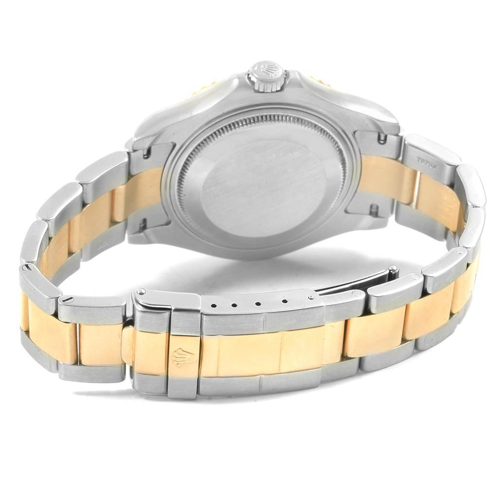 The image shows the back and bracelet of a Rolex Yacht-Master 168623 Men's Steel and Gold (two tone) Blue Dial 168623 Men's Steel and Gold (two tone) Blue Dial watch, highlighting the clasp and crown.