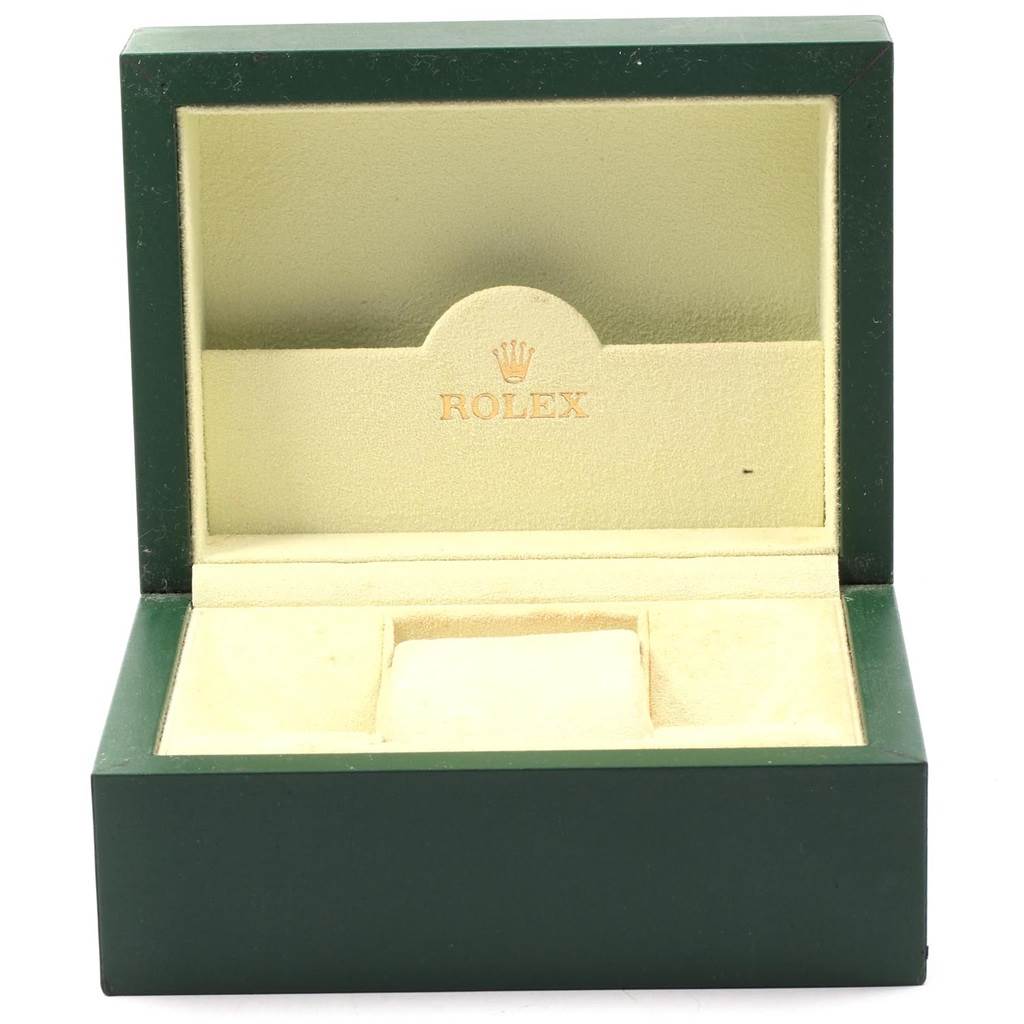 The image shows an open green Rolex watch box for the Yacht-Master model, with a padding compartment for the watch.