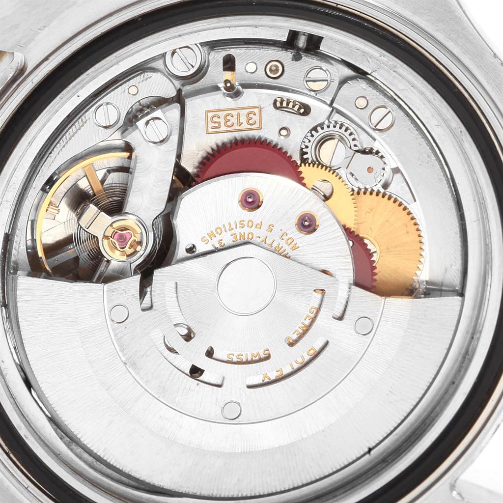 This image shows the internal mechanism of the Rolex Yacht-Master 16623 Men
s Stainless Steel White Dial 16623 Men
s Stainless Steel White Dial watch, highlighting gears and the rotor.