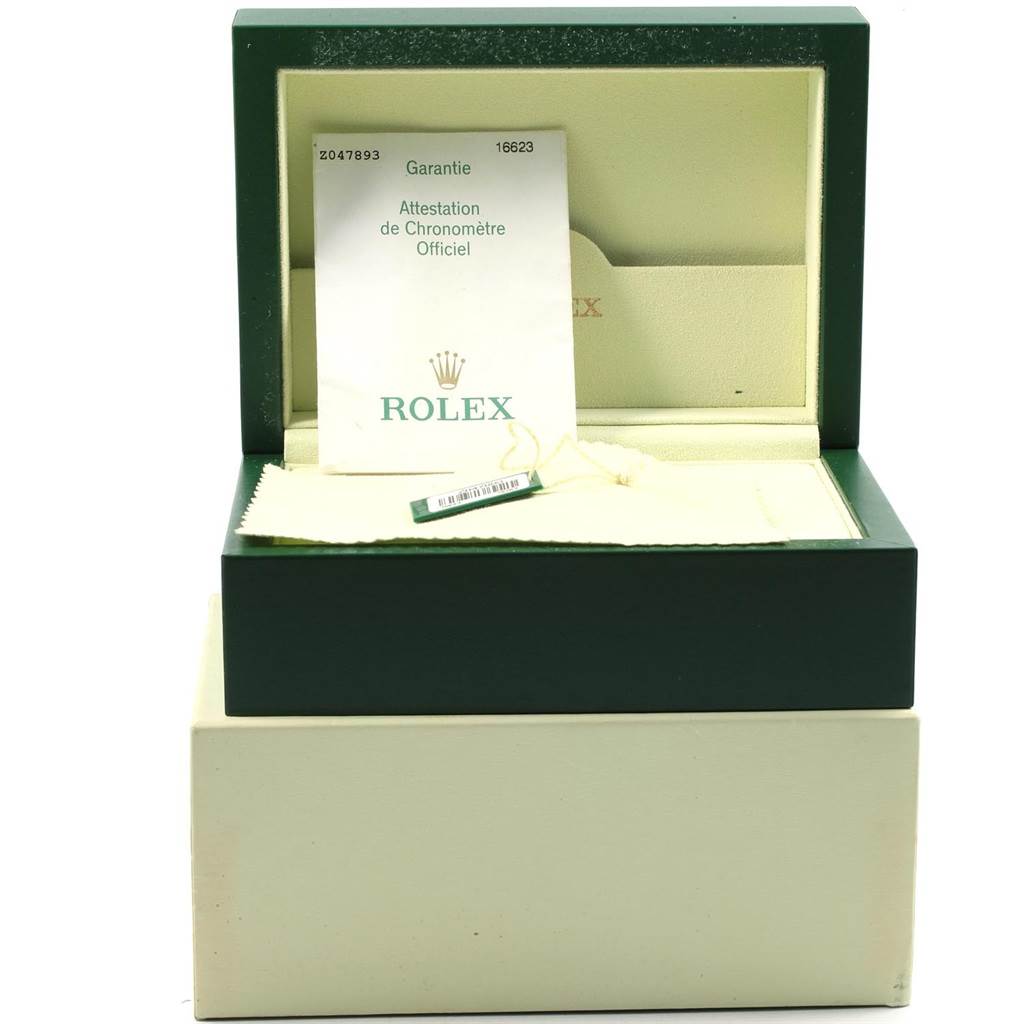 The image shows a Rolex Yacht-Master 16623 Men's Stainless Steel White Dial 16623 Men's Stainless Steel White Dial watch box with warranty card and cleaning cloth inside.