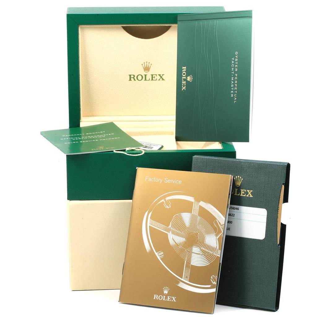 The image shows the packaging and accessories for a Rolex Yacht-Master 116622 Men's Stainless Steel Blue Dial 116622 Men's Stainless Steel Blue Dial watch, including booklets and service documents.