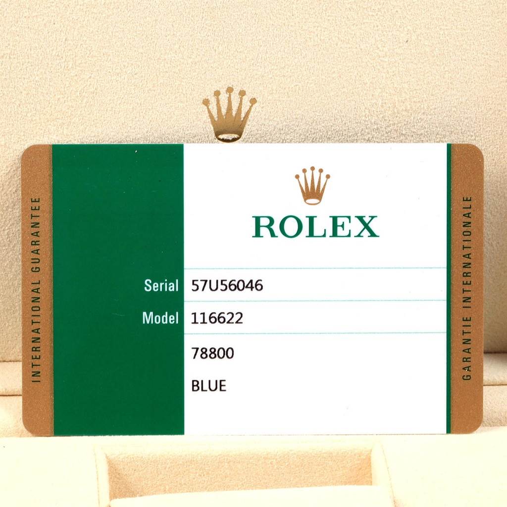 This image shows the warranty card for a Rolex Yacht-Master 116622 Men's Stainless Steel Blue Dial 116622 Men's Stainless Steel Blue Dial model watch, displaying the serial number, model number, and color.