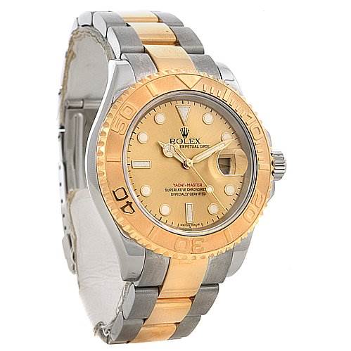 This image shows a Rolex Yacht-Master watch with a gold and steel bracelet, visible from a three-quarter angle, displaying the face and bezel clearly.
