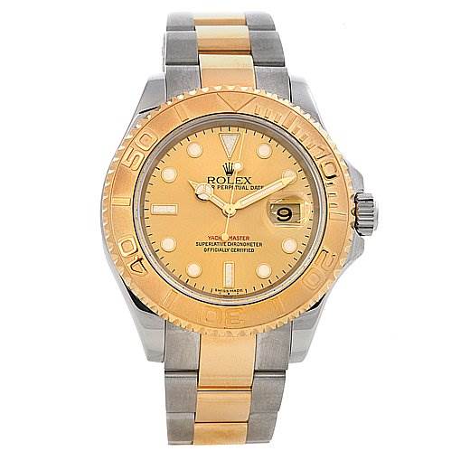The image shows a Rolex Yacht-Master watch, not the Cartier Tank Francaise 16623 Women's Steel and Gold (two tone) Champagne Dial 16623 Women's Steel and Gold (two tone) Champagne Dial, with a gold dial, two-tone bracelet, and gold bezel.