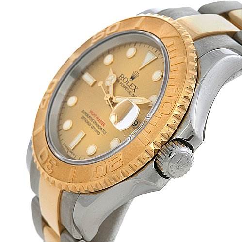 This image shows a Rolex watch, not a Cartier Tank Française, from an angled view highlighting the bezel, crown, and part of the bracelet.