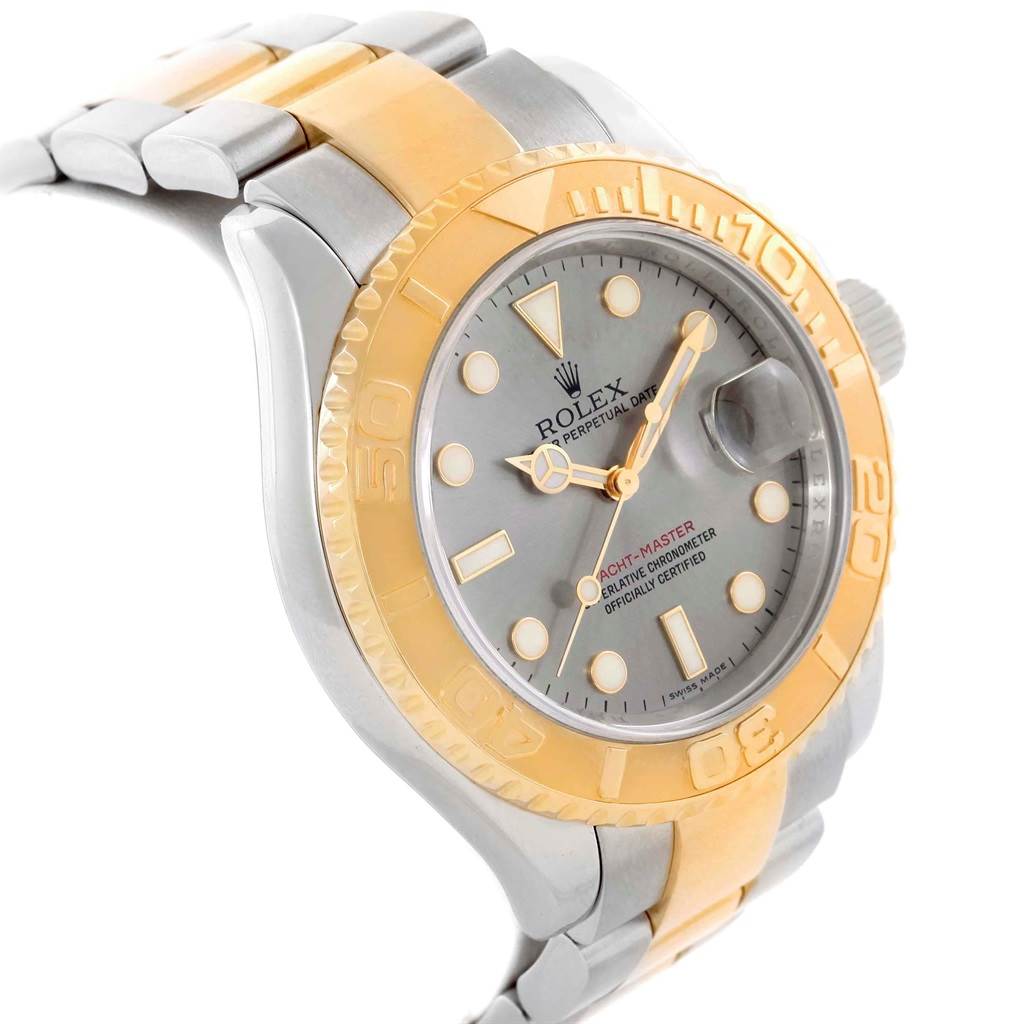 The angle shows the Yacht-Master Rolex watch from a side view, highlighting the dial, bezel, and part of the bracelet.