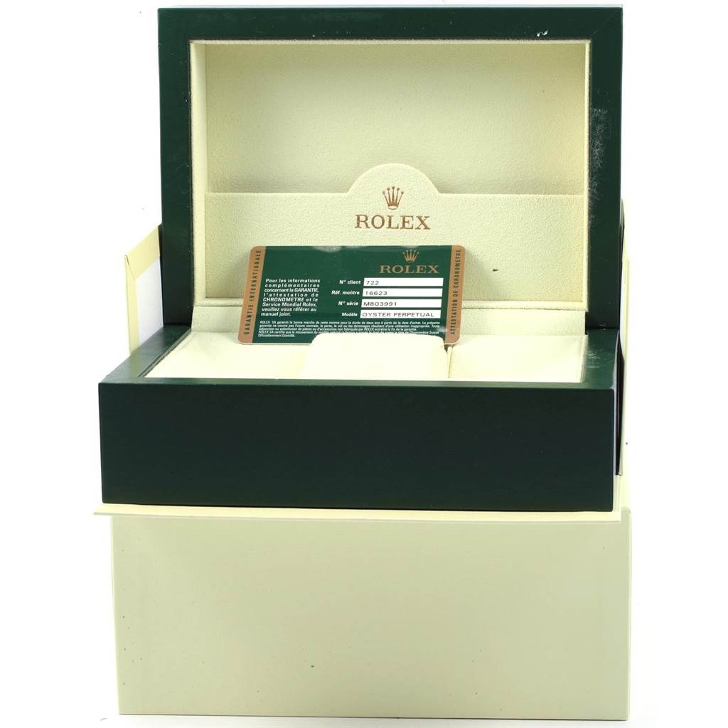 The image shows the open packaging box for a Rolex Yacht-Master 16623 Men's Stainless Steel Grey Dial 16623 Men's Stainless Steel Grey Dial watch, including a warranty card.