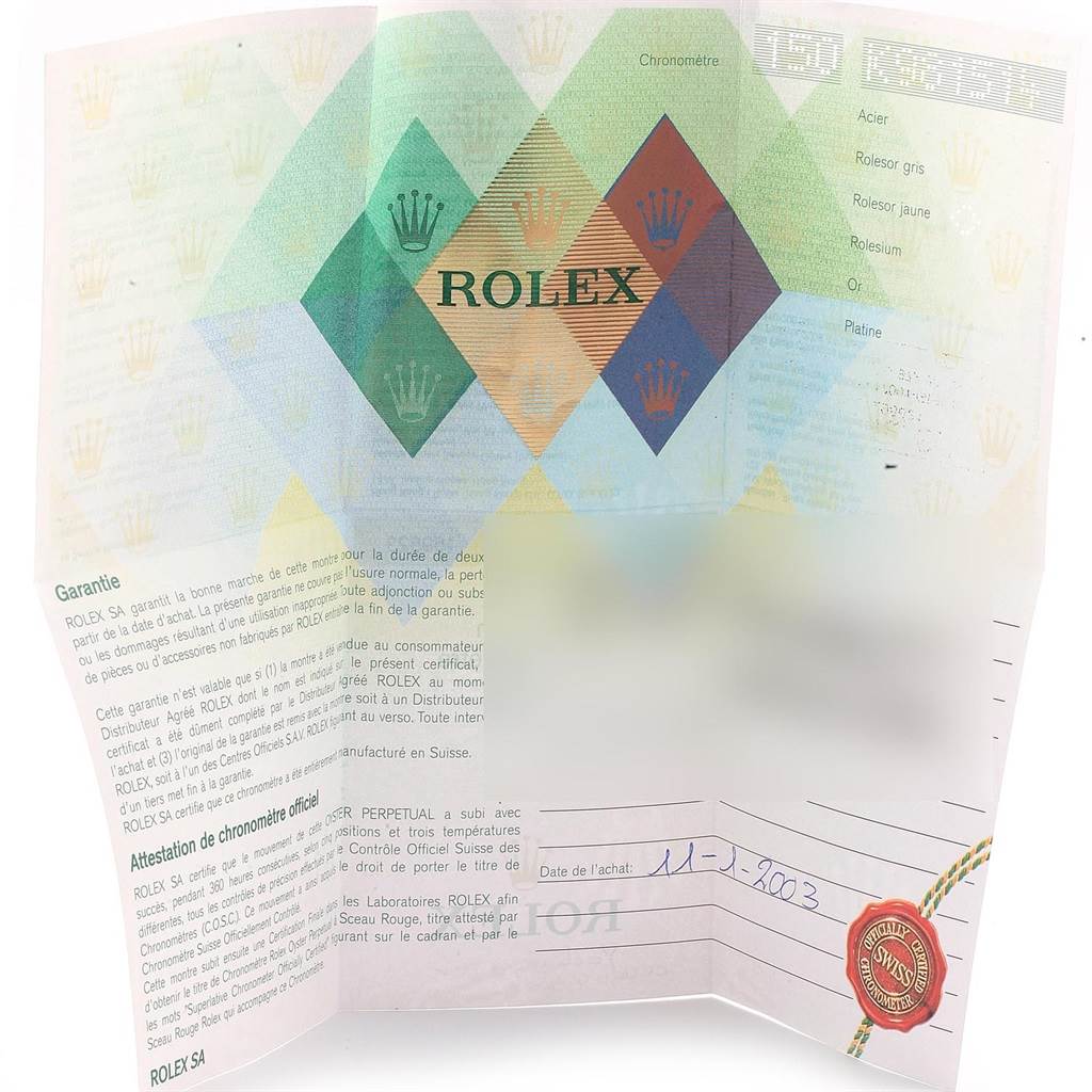 It is an unfolded warranty certificate for a Rolex Yacht-Master 169623 Women's Steel and Gold (two tone) White Dial 169623 Women's Steel and Gold (two tone) White Dial watch, displaying the brand's logo and purchase details.