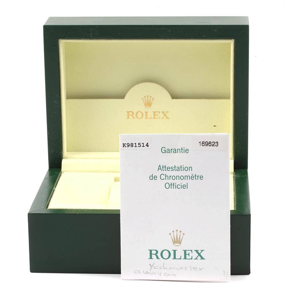 The image shows an open Rolex Yacht-Master 169623 Women's Steel and Gold (two tone) White Dial 169623 Women's Steel and Gold (two tone) White Dial watch box with its warranty card in front.