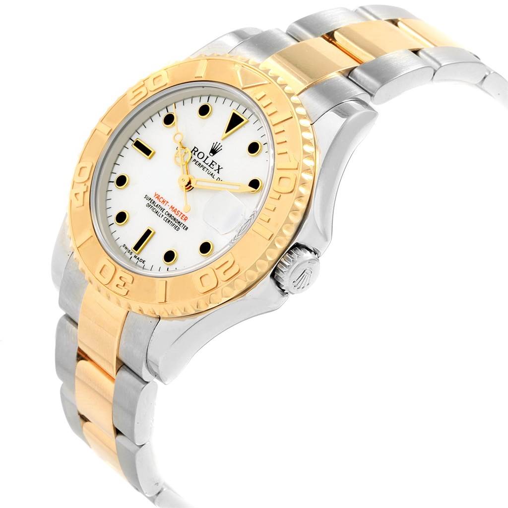 The Rolex Yacht-Master 168623 Men
s Steel and Gold (two tone) White Dial 168623 Men
s Steel and Gold (two tone) White Dial watch is shown at an angled view, highlighting its bezel, crown, and two-tone bracelet.