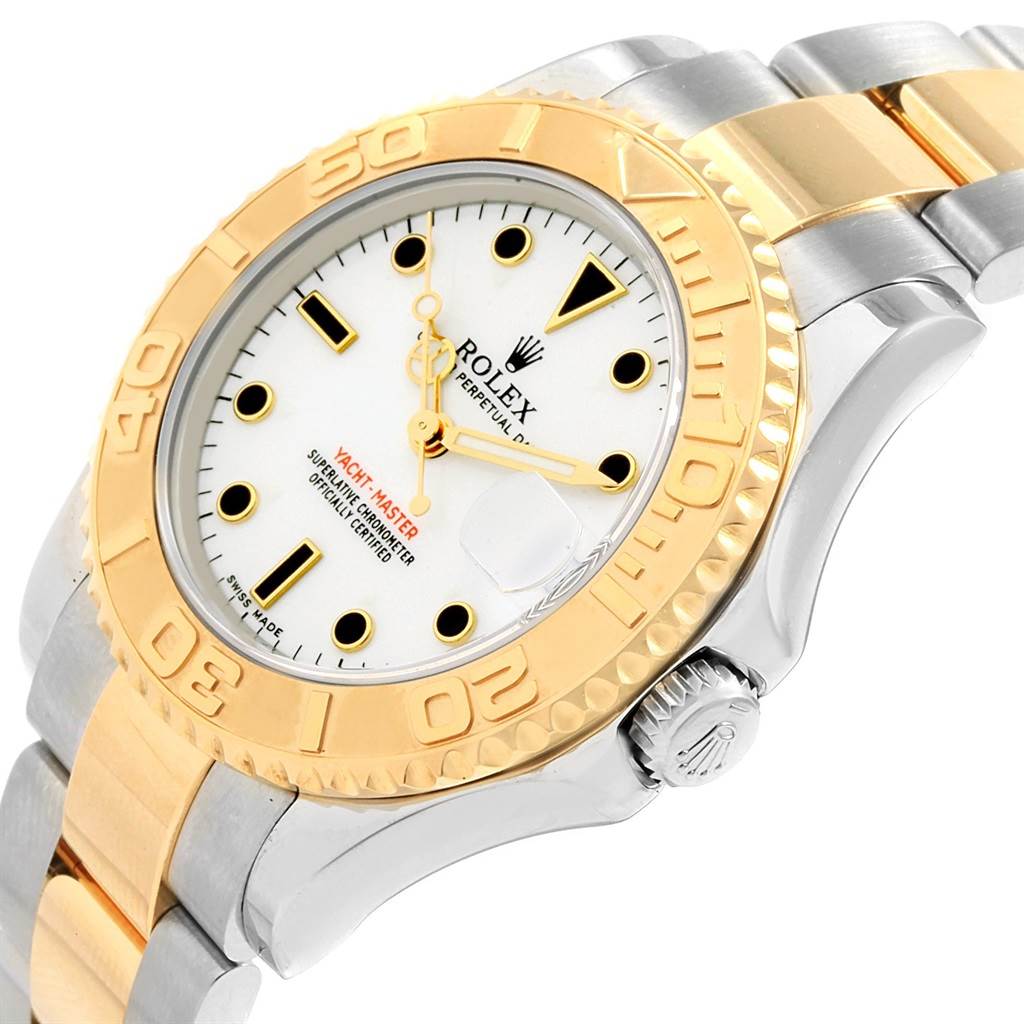 The Rolex Yacht-Master 168623 Men
s Steel and Gold (two tone) White Dial 168623 Men
s Steel and Gold (two tone) White Dial watch is shown at a slight angle, highlighting its gold bezel, white dial, and two-tone bracelet.
