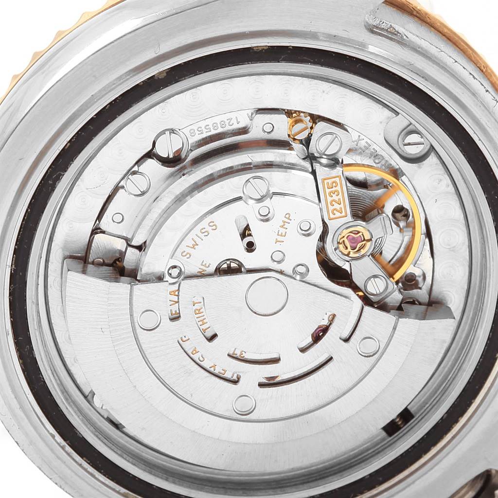 The image shows a close-up of the internal movement mechanism of a Rolex Yacht-Master 168623 Men
s Steel and Gold (two tone) White Dial 168623 Men
s Steel and Gold (two tone) White Dial watch.