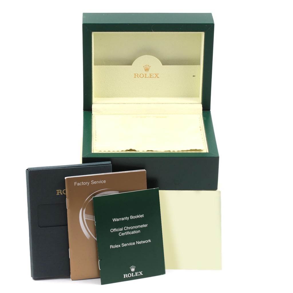 The image shows the packaging and accessories for a Rolex Yacht-Master 168623 Men
s Steel and Gold (two tone) White Dial 168623 Men
s Steel and Gold (two tone) White Dial watch, including the box, warranty booklet, and service booklets.