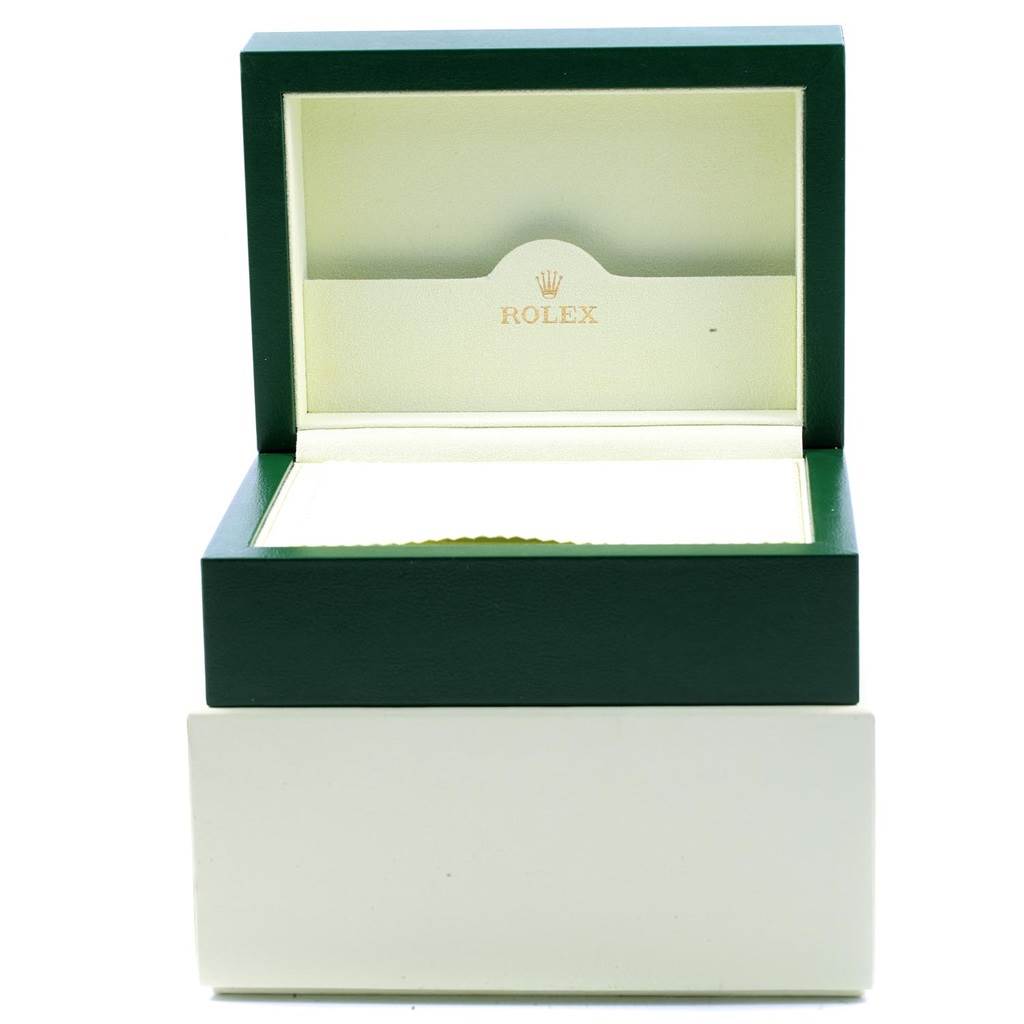 This image shows an empty Rolex Yacht-Master 168622 Men's Stainless Steel Silver Dial 168622 Men's Stainless Steel Silver Dial green and gold watch box with the lid open.