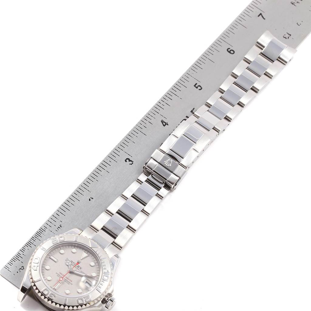 This image shows a Rolex Yacht-Master 168622 Men's Stainless Steel Silver Dial 168622 Men's Stainless Steel Silver Dial watch at an angled top view, highlighting the face and metal bracelet next to a ruler.