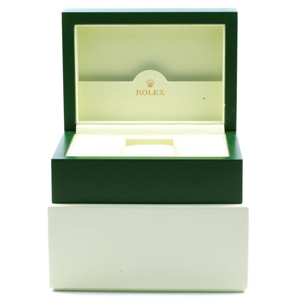 This image shows an open Rolex Yacht-Master 168623 Men's Steel and Gold (two tone) White Dial 168623 Men's Steel and Gold (two tone) White Dial watch box with a green exterior and cream interior.
