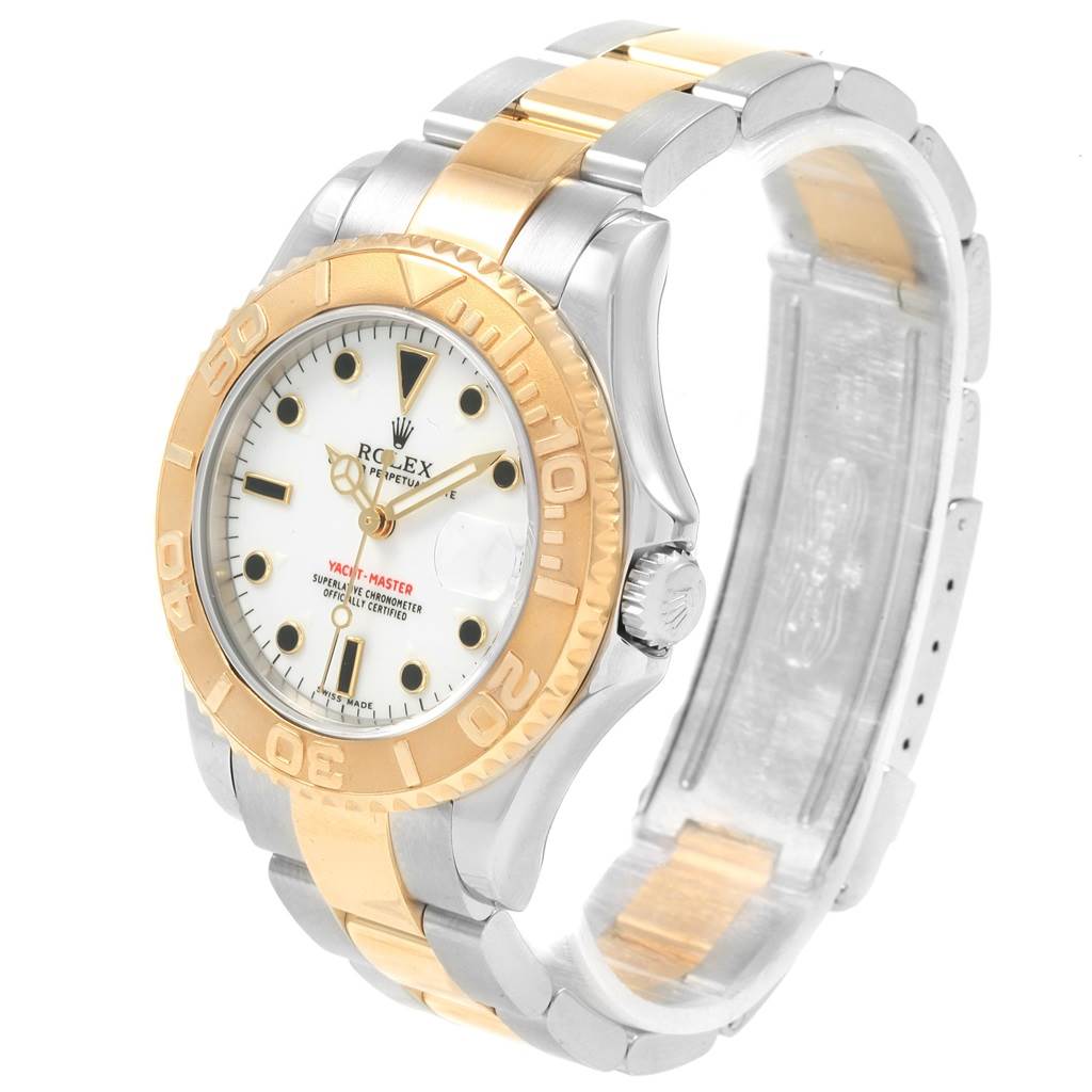 The image shows a Rolex Yacht-Master 168623 Men's Steel and Gold (two tone) White Dial 168623 Men's Steel and Gold (two tone) White Dial watch at an oblique angle, highlighting its bezel, dial, and two-tone bracelet.