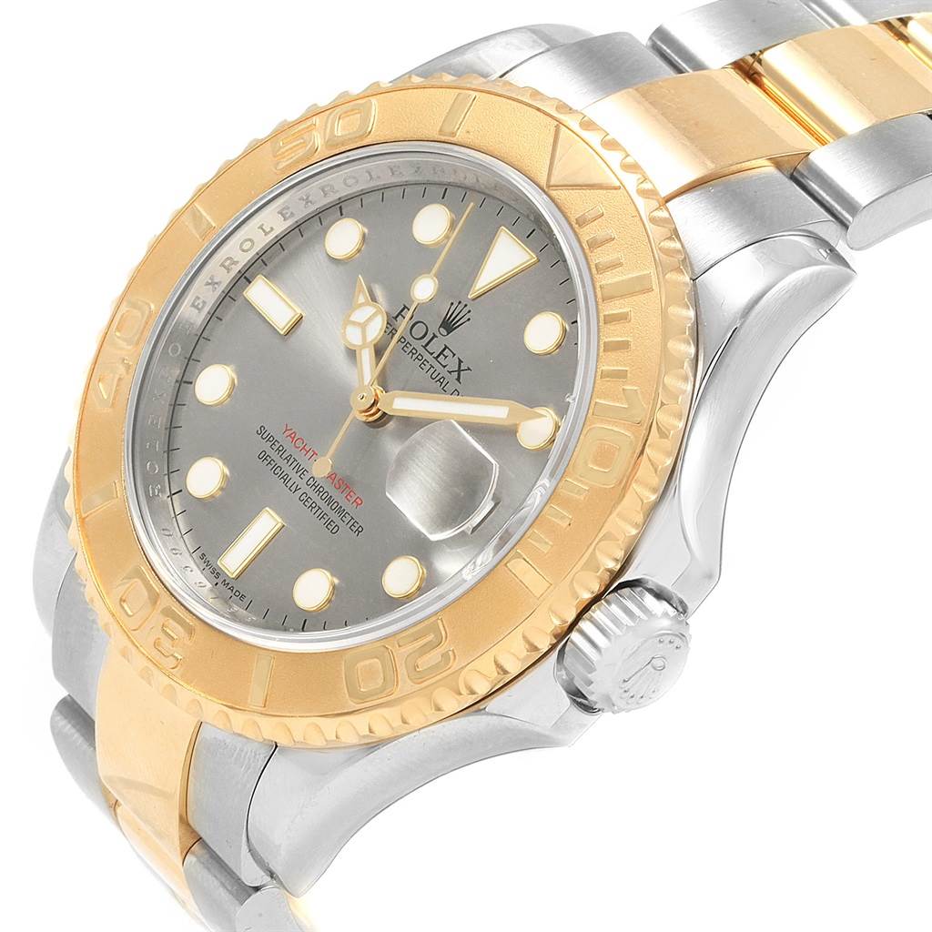 This image shows a Rolex Yacht-Master 16623 Men's Stainless Steel Grey Dial 16623 Men's Stainless Steel Grey Dial watch at an angled view, highlighting the gold bezel, dial, and bracelet.