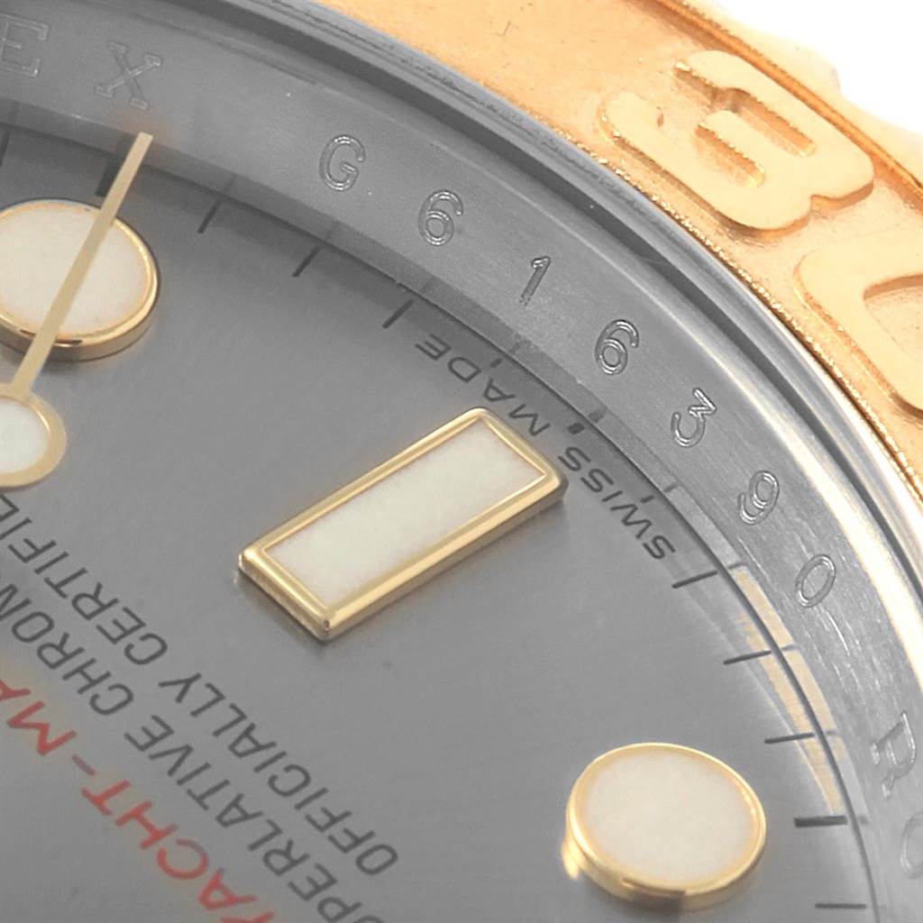 Close-up of the Rolex Yacht-Master 16623 Men's Stainless Steel Grey Dial 16623 Men's Stainless Steel Grey Dial showing part of the dial, hour markers, hands, and bezel.