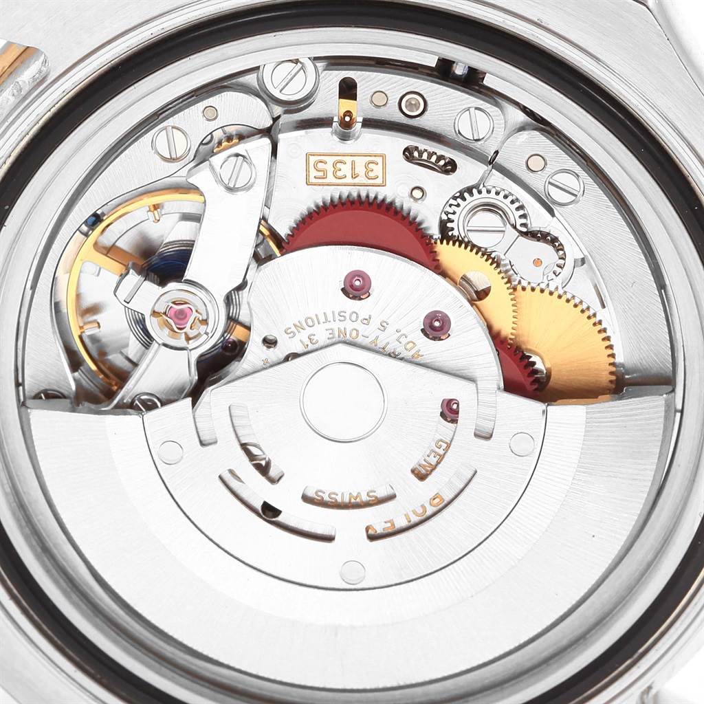 This image shows the internal mechanism of a Rolex Yacht-Master 16623 Men's Stainless Steel Grey Dial 16623 Men's Stainless Steel Grey Dial watch viewed from the back, highlighting the movement components.