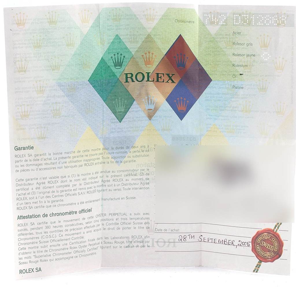This image shows the warranty card and certification papers for a Rolex Yacht-Master 16623 Men's Stainless Steel Grey Dial 16623 Men's Stainless Steel Grey Dial watch.