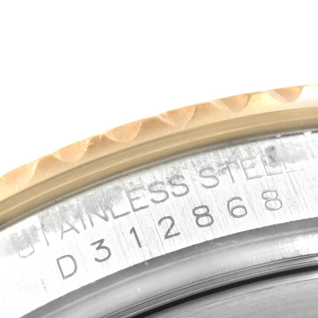 This image shows a close-up of the edge of the bezel and part of the back case, featuring the model engraving of the Rolex Yacht-Master 16623 Men's Stainless Steel Grey Dial 16623 Men's Stainless Steel Grey Dial watch.