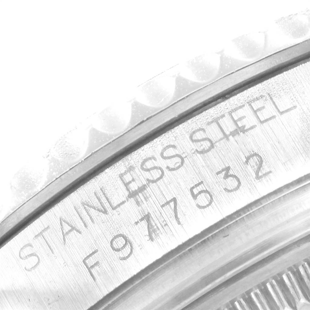 This image shows a close-up of the stainless steel back and serial number of a Rolex Yacht-Master 168622 Men
s Stainless Steel Silver Dial 168622 Men
s Stainless Steel Silver Dial watch.
