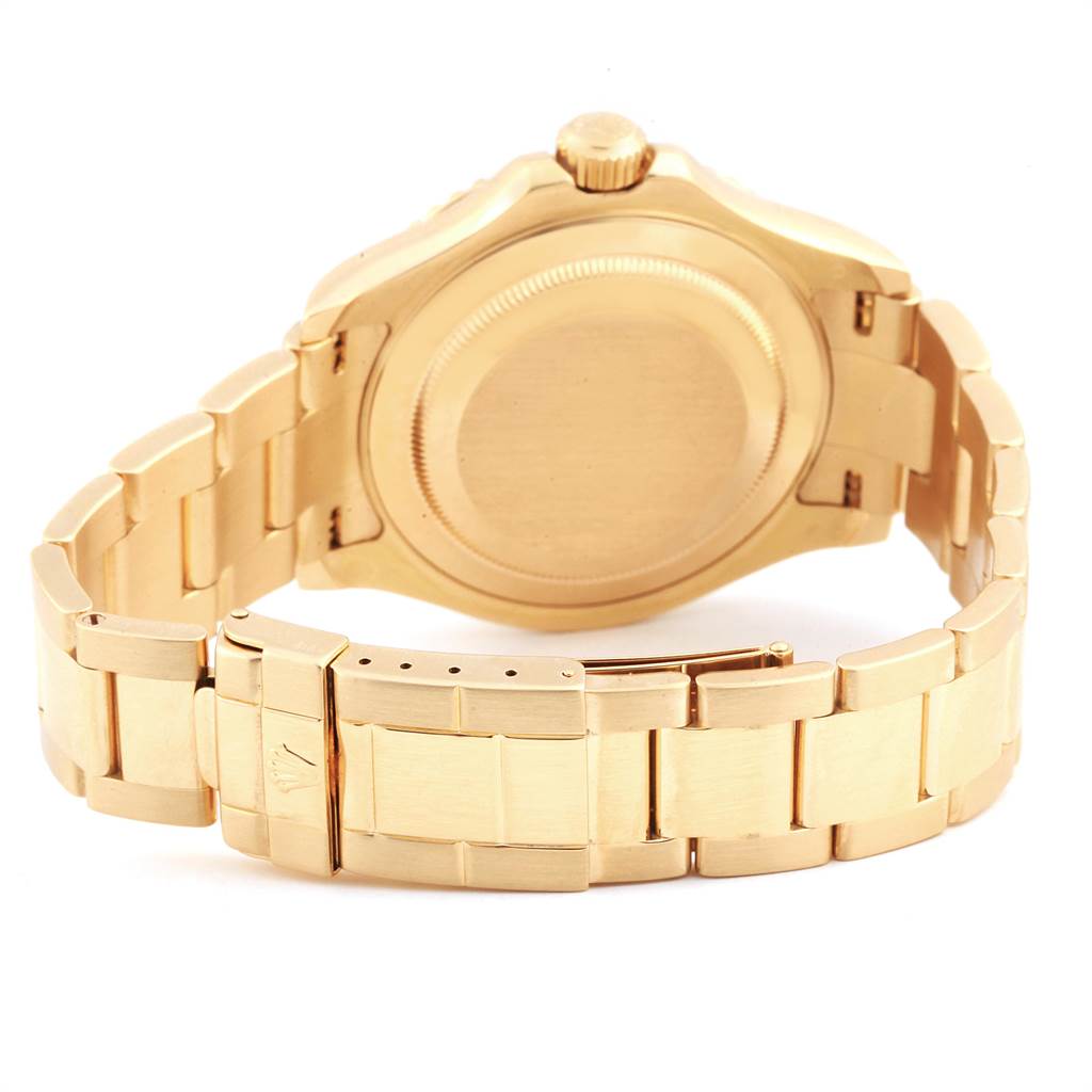 The image showcases the back and bracelet of a Rolex Yacht-Master 16628 Men's Yellow Gold White Dial 16628 Men's Yellow Gold White Dial watch, focusing on the case back and clasp.
