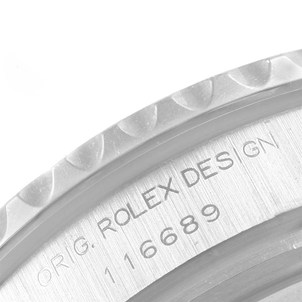 This image shows a close-up of the bezel and the engraved inner caseback of the Rolex Yacht-Master 116689 Men's White Gold White Dial 116689 Men's White Gold White Dial watch model.