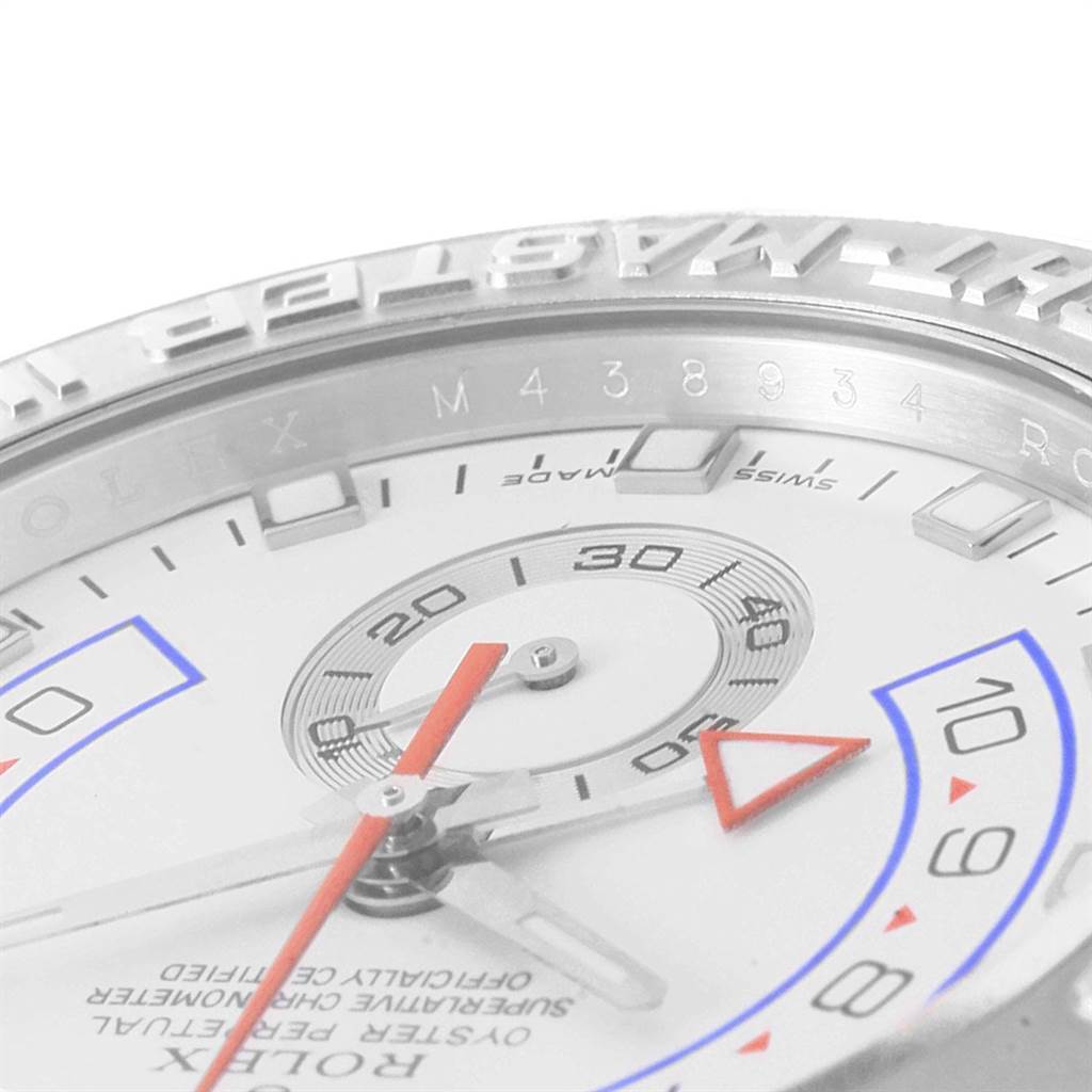 The image shows a close-up angle of the Rolex Yacht-Master 116689 Men's White Gold White Dial 116689 Men's White Gold White Dial watch face, highlighting the bezel, hour markers, and hands.