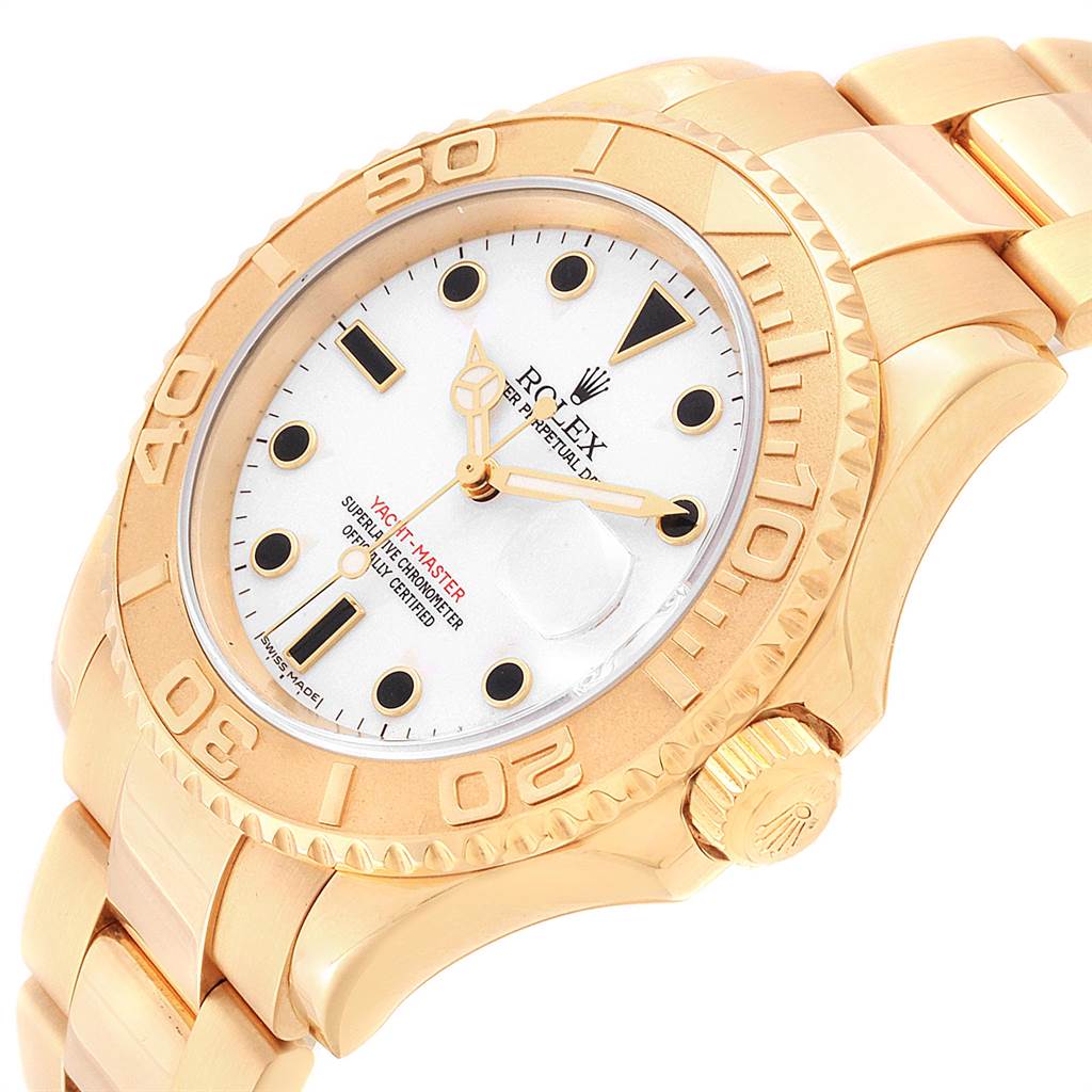 The image shows a Rolex Yacht-Master 16628 Men's Yellow Gold White Dial 16628 Men's Yellow Gold White Dial watch angled from the top right, highlighting the dial, bezel, and bracelet.