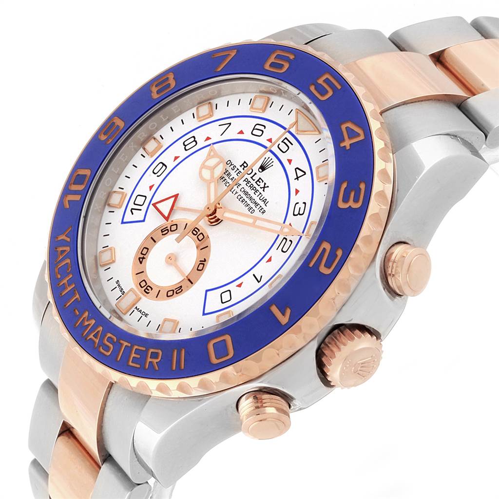 The image shows a close-up angle of the Rolex Yacht-Master 116681 Men
s Steel and Gold (two tone) White Dial 116681 Men
s Steel and Gold (two tone) White Dial watch face and its side buttons.