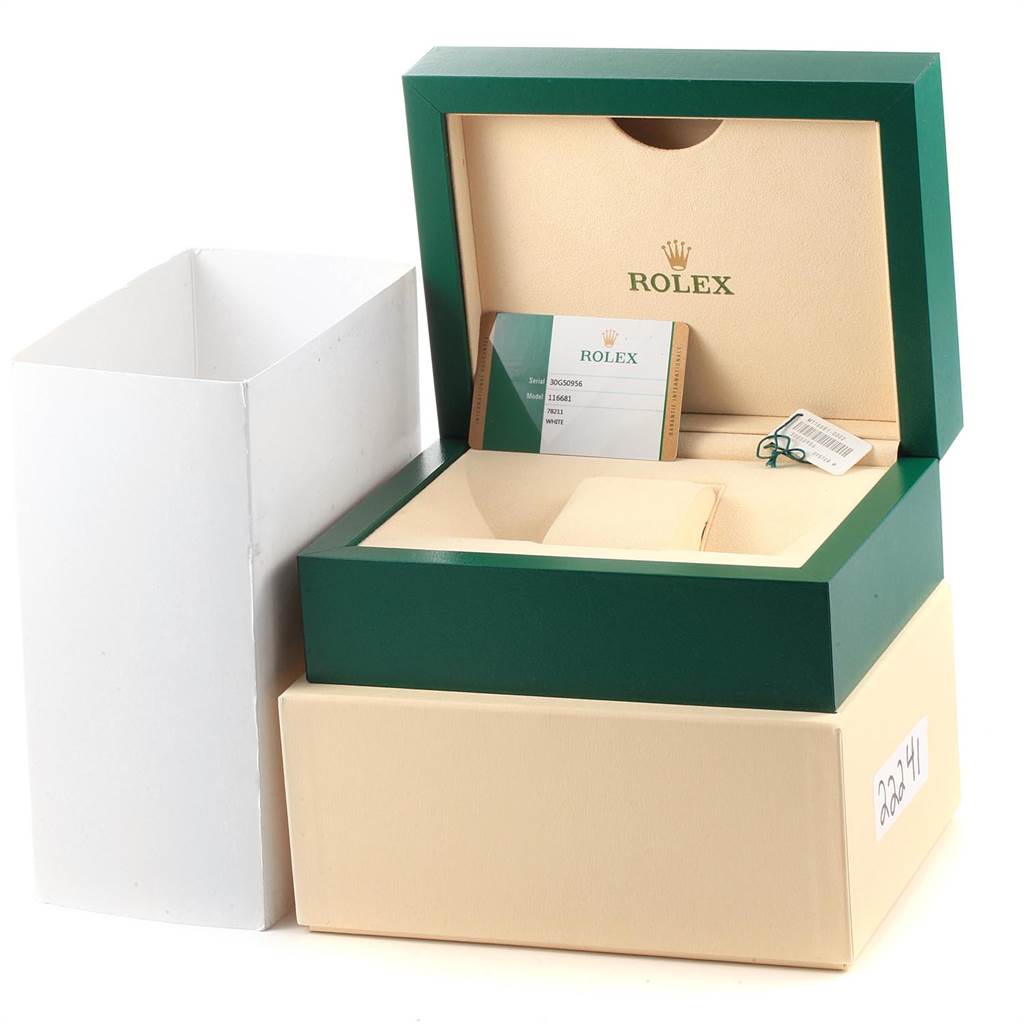 The image shows the packaging box and accessories of a Rolex Yacht-Master 116681 Men
s Steel and Gold (two tone) White Dial 116681 Men
s Steel and Gold (two tone) White Dial watch, including a certificate and tag.