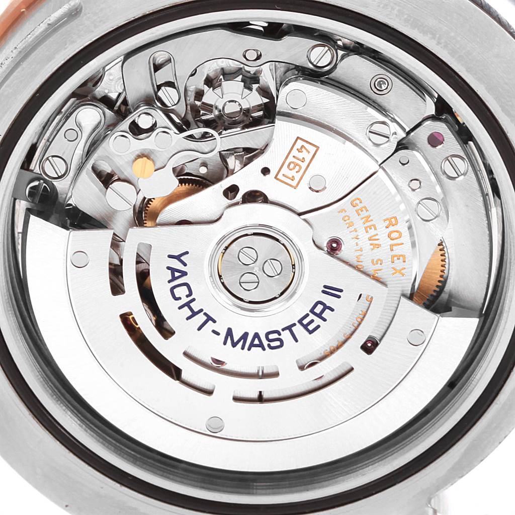 The image shows the back view of the Rolex Yacht-Master 116681 Men
s Steel and Gold (two tone) White Dial 116681 Men
s Steel and Gold (two tone) White Dial II watch, focusing on its intricate movement parts.