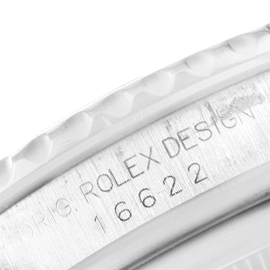 This close-up angle shows the side engraving on the case of a Rolex Yacht-Master 16622 Men's Stainless Steel Silver Dial 16622 Men's Stainless Steel Silver Dial model 16622.