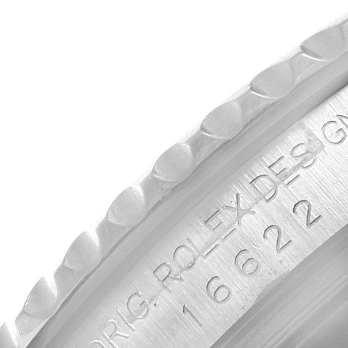 This is a close-up shot of the bezel and side of a Rolex Yacht-Master 16622 Men's Stainless Steel Silver Dial 16622 Men's Stainless Steel Silver Dial watch.