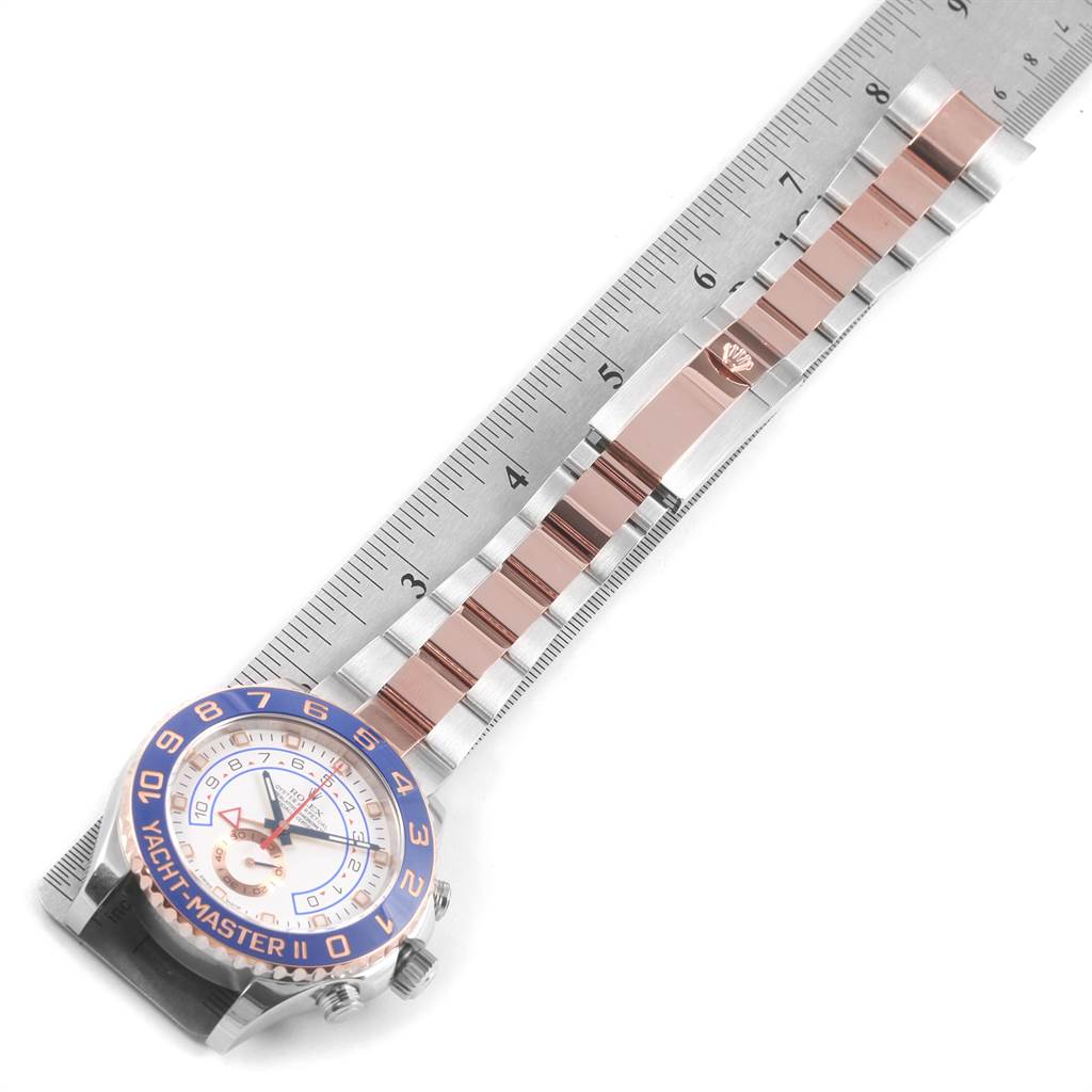 The Rolex Yacht-Master 116681 Men's Steel and Gold (two tone) White Dial 116681 Men's Steel and Gold (two tone) White Dial watch is shown from a top-down angle, focusing on the face, bezel, and bracelet.