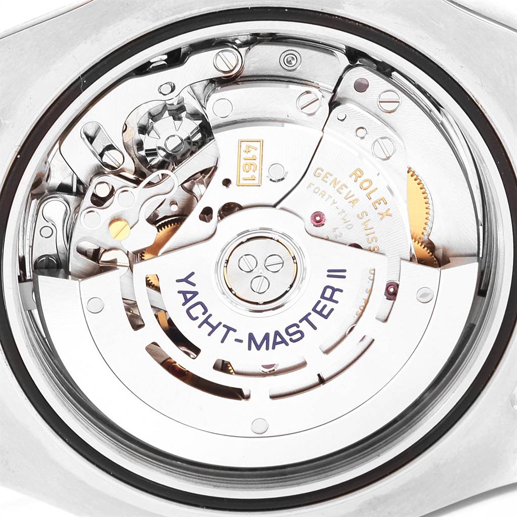 The image shows the internal mechanism of a Rolex Yacht-Master 116681 Men's Steel and Gold (two tone) White Dial 116681 Men's Steel and Gold (two tone) White Dial II watch viewed from the back, highlighting its intricate details.