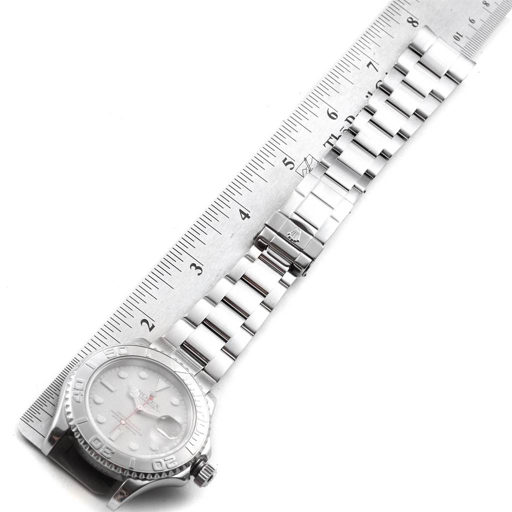 The image shows the Rolex Yacht-Master 16622 Men's Stainless Steel Silver Dial 16622 Men's Stainless Steel Silver Dial watch lying flat, highlighting its bracelet, clasp, and part of the dial.