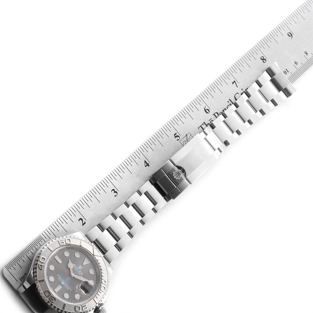 The image shows the Rolex Yacht-Master 116622 Men
s Stainless Steel Grey Dial 116622 Men
s Stainless Steel Grey Dial watch at an angled top-down view with a ruler measuring its bracelet length.