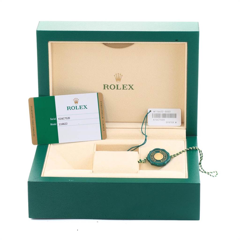 The image shows an open green Rolex box for the Yacht-Master model, with a certification card and tag inside.