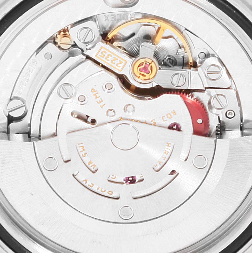This image shows a close-up view of the Rolex Yacht-Master 168623 Men
s Steel and Gold (two tone) White Dial 168623 Men
s Steel and Gold (two tone) White Dial watch movement from the back, featuring intricate mechanical components.
