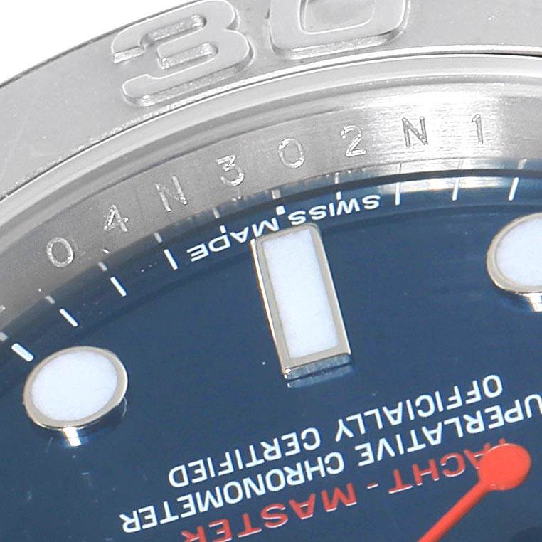This close-up image of a Rolex Yacht-Master 116622 Men
s Stainless Steel Blue Dial 116622 Men
s Stainless Steel Blue Dial watch shows part of the bezel and the dial, highlighting the "30" mark and some text.