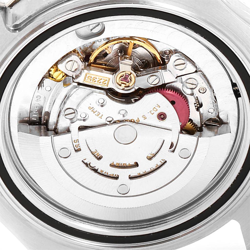 This image shows a close-up of the movement inside a Rolex Yacht-Master 168622 Men's Stainless Steel Silver Dial 168622 Men's Stainless Steel Silver Dial watch, revealing its intricate mechanical parts.