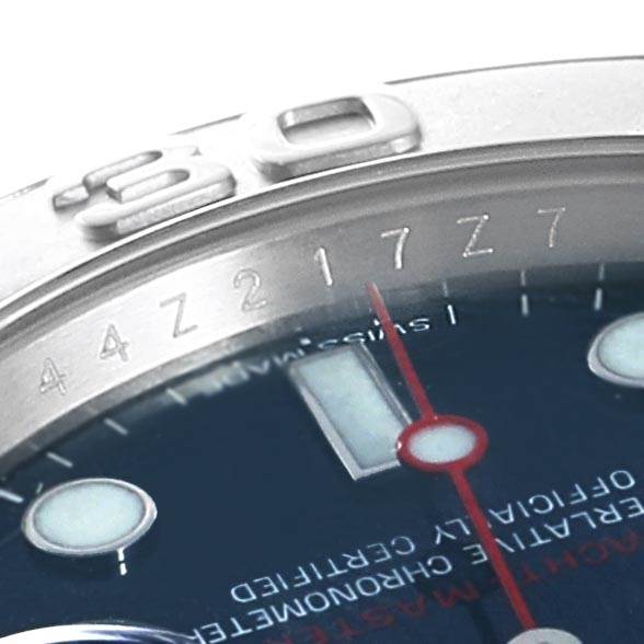 Close-up view of the Rolex Yacht-Master 116622 Men's Stainless Steel Blue Dial 116622 Men's Stainless Steel Blue Dial watch showing part of the bezel, dial, and hour markers at an oblique angle.